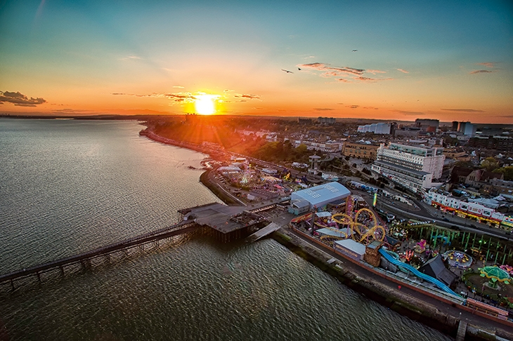 Aerial photo of Southend Pier and the City of Southend-on-Sea to the west at sun sets